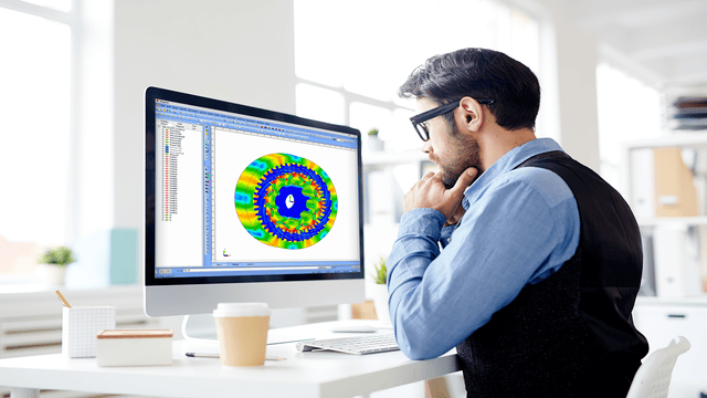 An engineer working with Simcenter MAGNET