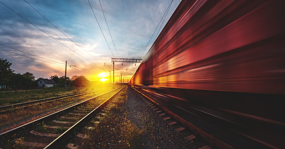 Changing the flow to bridge the gap: Rail car aerodynamics and drag