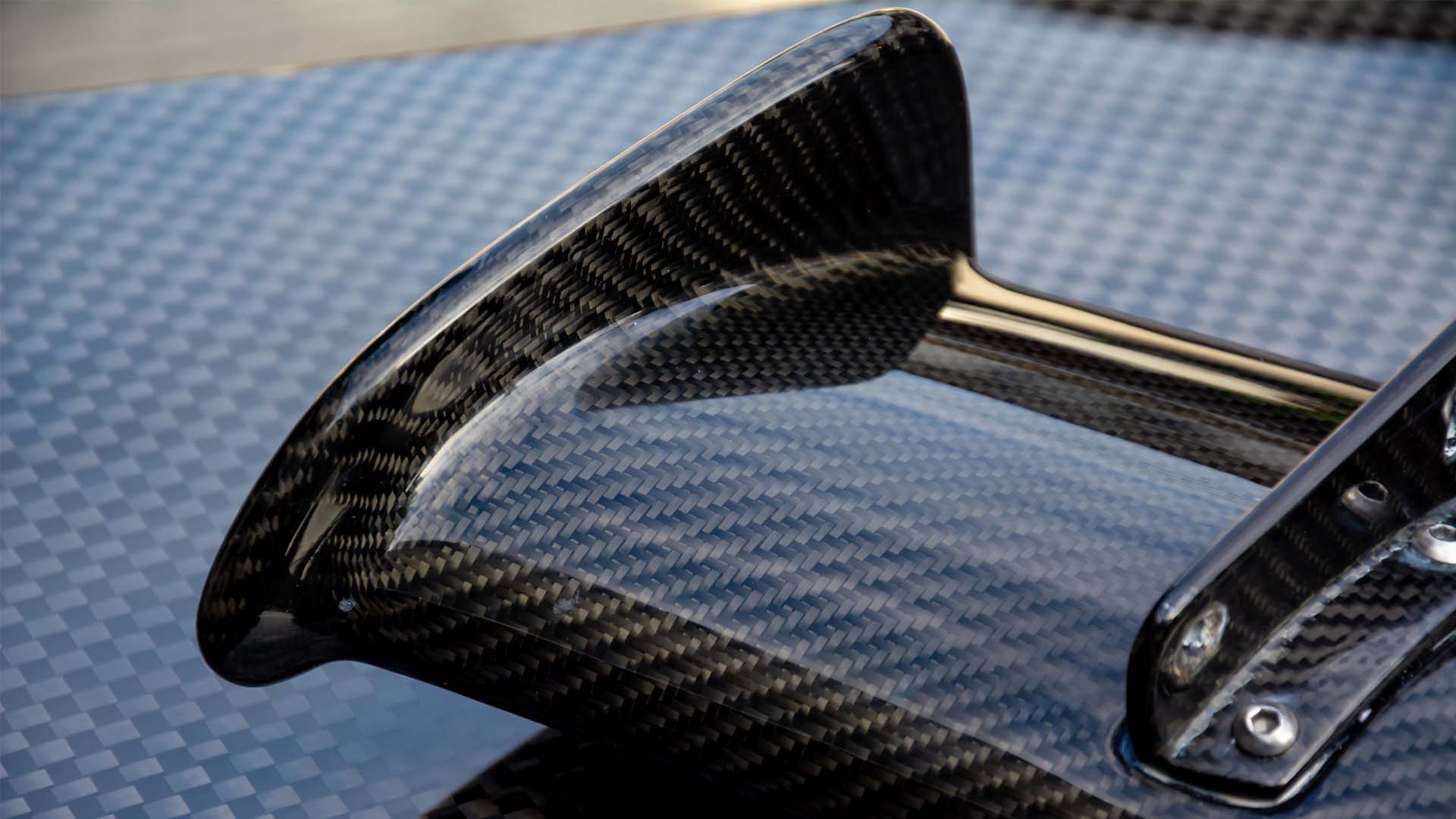 A composite automotive wing