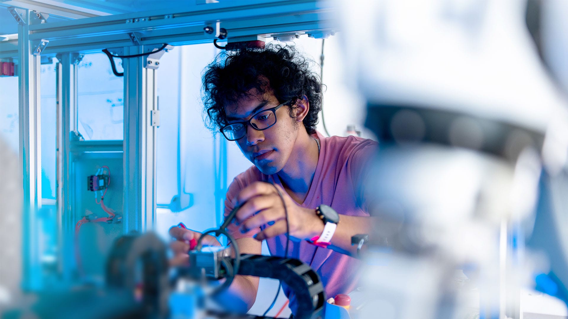 A person working on an electrical component